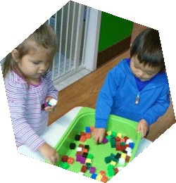 children playing with blocks at Happy Bees Daycare