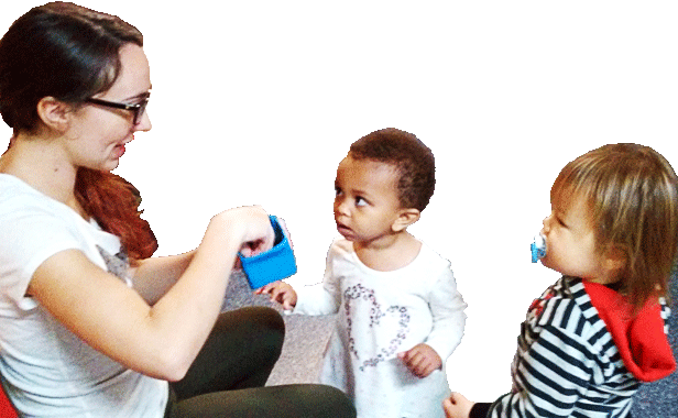 caregiver and two toddlers at Happy Bees Daycare