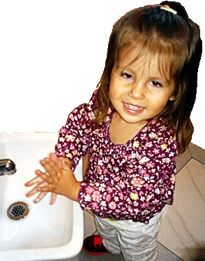 child washing her hands at Happy Bees Daycare